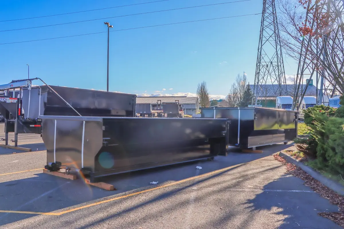 Roll-off dumpster ready for waste disposal at job site for Roofing Dumpster Rental in Leonia